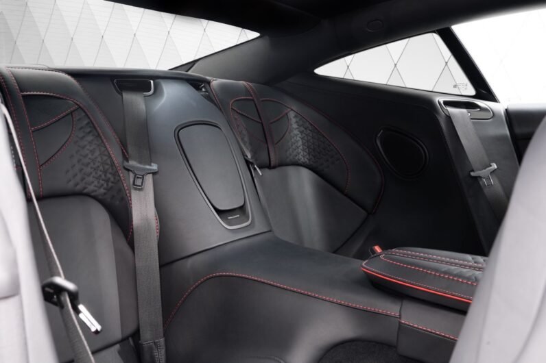 Aston Martin DBS Coupé 2024 for Sale – Q-Supernova Red, 21″ Forged Wheels, Carbon Fiber Trim, Bang & Olufsen, 725 HP V12, Sport Seats