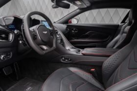 Aston Martin DBS Coupé 2024 for Sale – Q-Supernova Red, 21″ Forged Wheels, Carbon Fiber Trim, Bang & Olufsen, 725 HP V12, Sport Seats