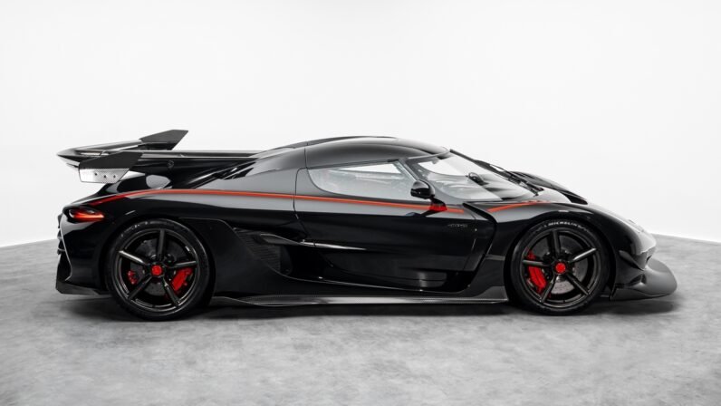 Koenigsegg Jesko Attack 2024 for Sale – Clear Carbon Fibre / Red Exterior, Lingonberry Alcantara Interior, 1,600 HP V8, 9-Speed LST
