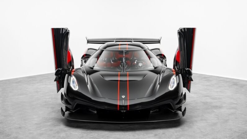 Koenigsegg Jesko Attack 2024 for Sale – Clear Carbon Fibre / Red Exterior, Lingonberry Alcantara Interior, 1,600 HP V8, 9-Speed LST