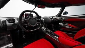 Koenigsegg Jesko Attack 2024 for Sale – Clear Carbon Fibre / Red Exterior, Lingonberry Alcantara Interior, 1,600 HP V8, 9-Speed LST