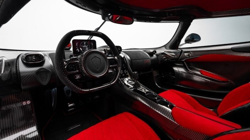 Koenigsegg Jesko Attack 2024 for Sale – Clear Carbon Fibre / Red Exterior, Lingonberry Alcantara Interior, 1,600 HP V8, 9-Speed LST