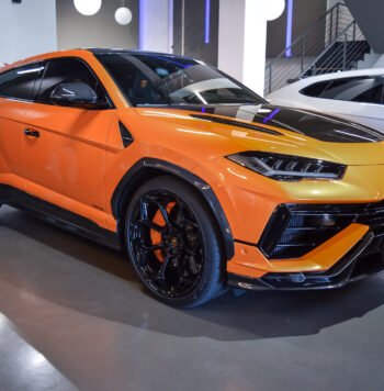 Lamborghini Urus Performante 2024 for sale in Arancio Borealis with 666 HP V8, carbon fibre hood, titanium exhaust and Alcantara interior.