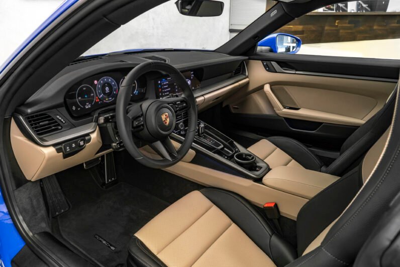 For Sale: Porsche 911 Carrera 2025 – Blue Metallic, Beige/Black Interior, 385 HP Flat-6, 1,900 km