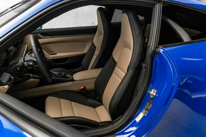 For Sale: Porsche 911 Carrera 2025 – Blue Metallic, Beige/Black Interior, 385 HP Flat-6, 1,900 km