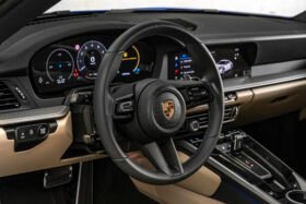 For Sale: Porsche 911 Carrera 2025 – Blue Metallic, Beige/Black Interior, 385 HP Flat-6, 1,900 km
