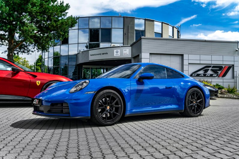 For Sale: Porsche 911 Carrera 2025 – Blue Metallic, Beige/Black Interior, 385 HP Flat-6, 1,900 km